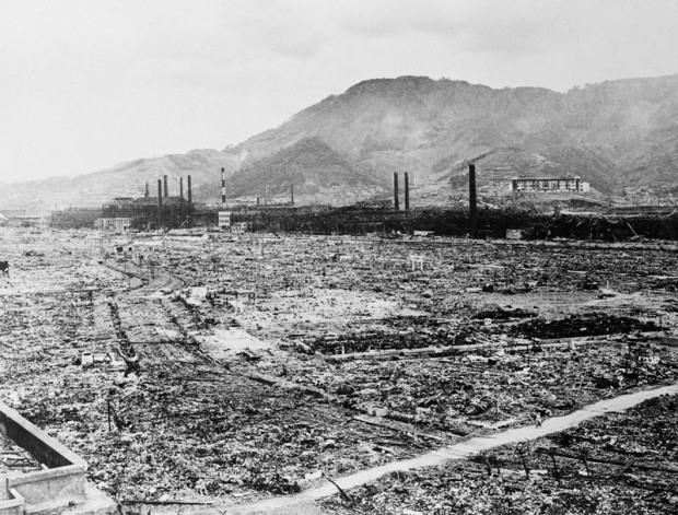 Original caption: 6/26/1946-Nagasaki, Japan: The leveled area you see here was once the industrial heart of the great city of Nagasaki.  A single atomic bomb, the third ever exploded, made it a wilderness.  In the background, the skeletal remains of the Mitsubishi steel and arms works survived for use as junk. Nagasaki, Japan
